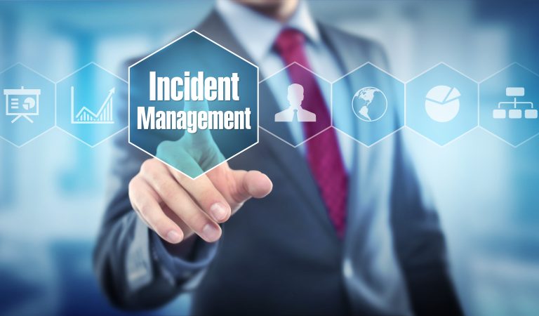 picture of a person touching a button that reads incident management